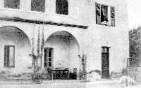 Theon's house in Tlemcen, Algeria. The Mother is looking out of window